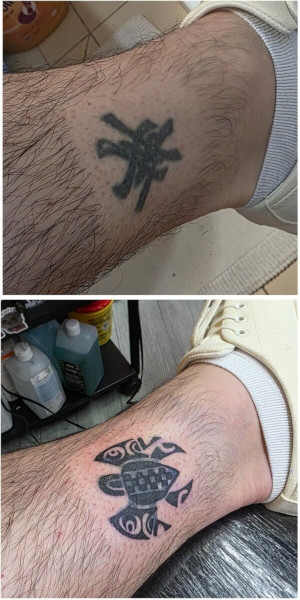 Small tribal to turtle tattoo coverup