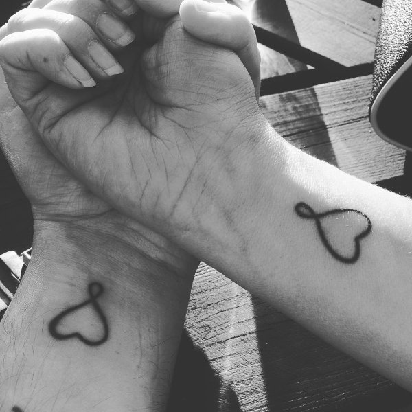 Guest - infinity hearts tattoo